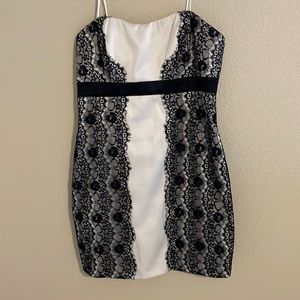 Max and Cleo size 12 champagne colored dress with black lace. 29” in length.